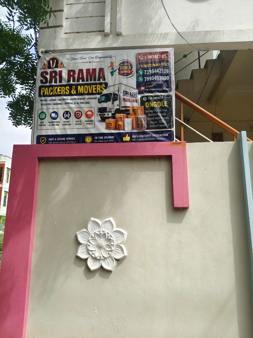 Sri Rama Packers & Movers signboard with contact details